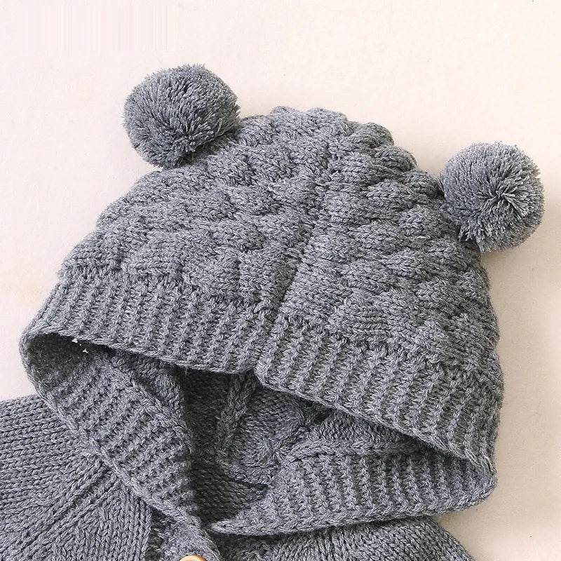 Barboteuse bébé à capuche
