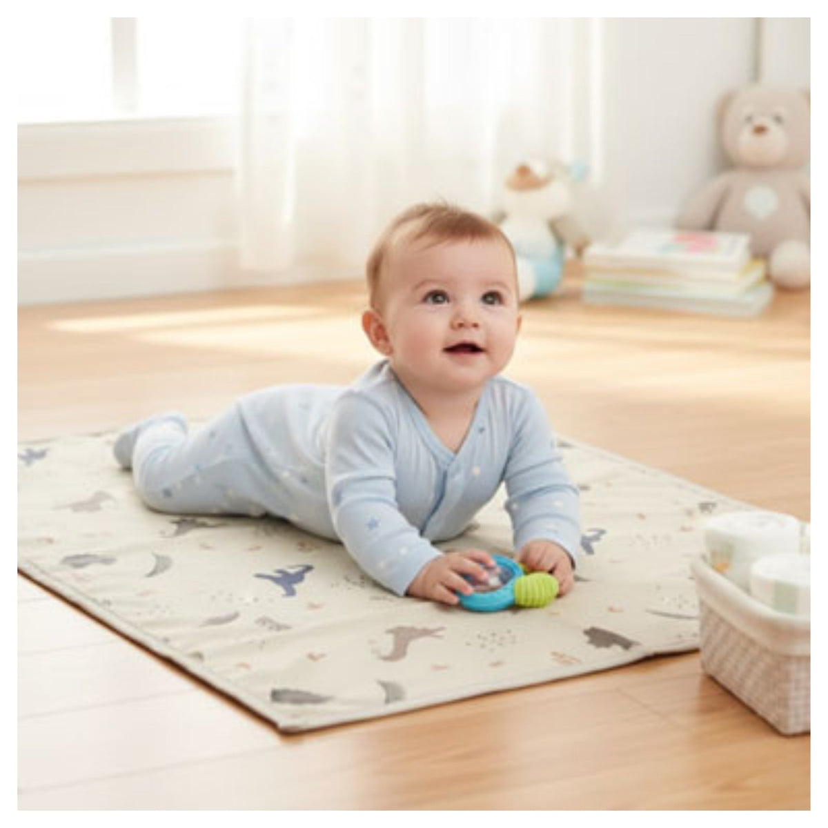Tapis à langer nomade compact avec surface rembourrée confortable pour bébé