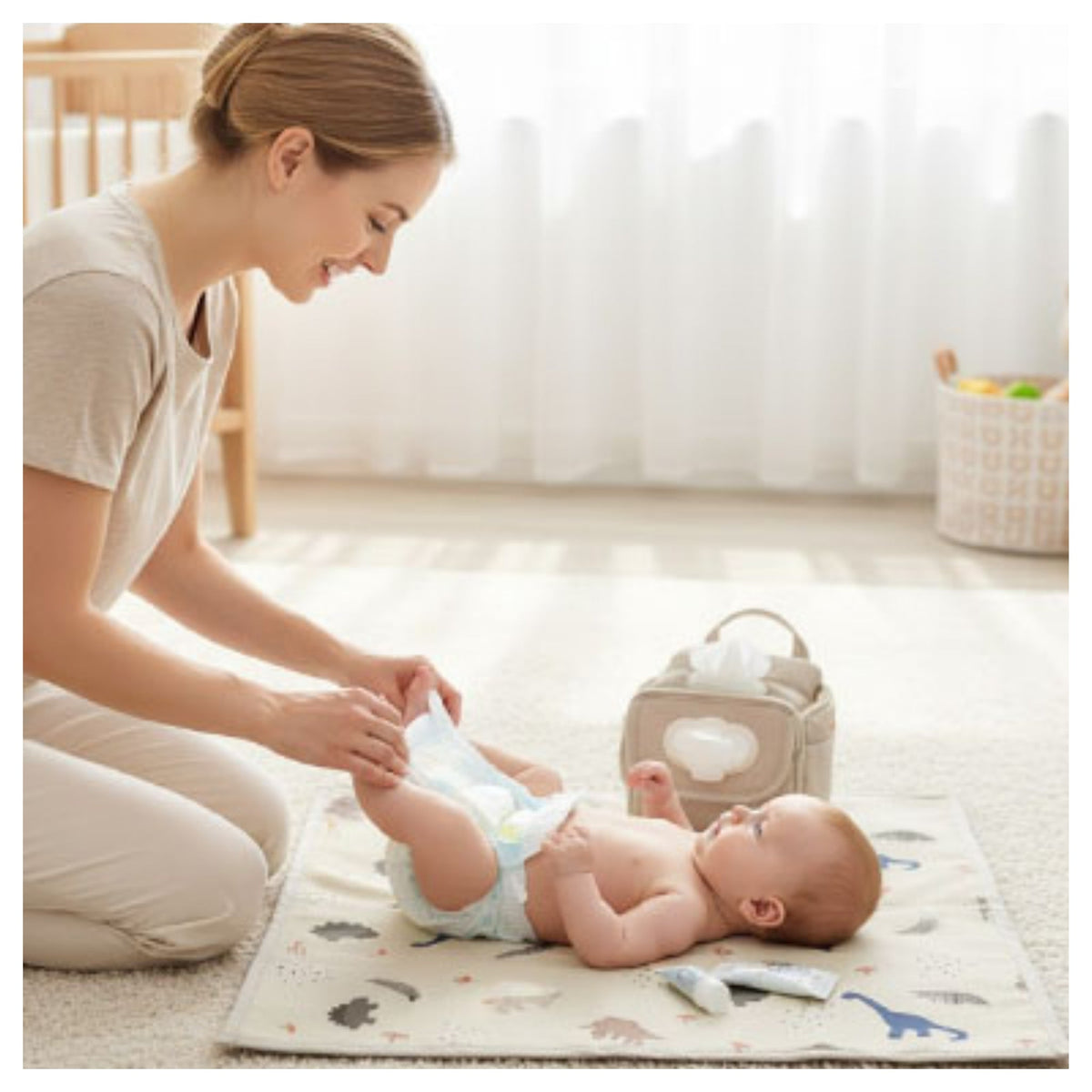 Tapis à langer portable ouvert montrant la surface rembourrée et imperméable