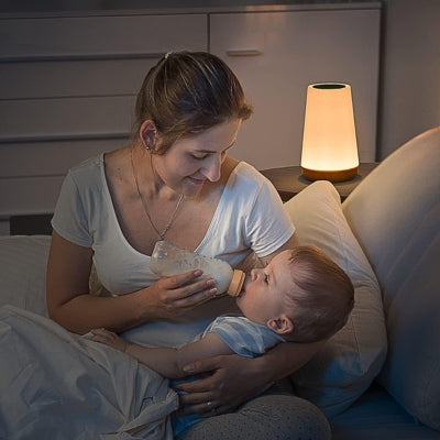 Veilleuse bébé LED multicolore créant ambiance apaisante pour nuit